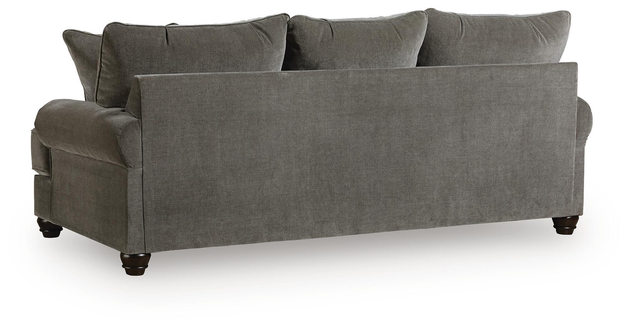 Gray sofa sleeper with rolled arms, visible base legs, and plush back cushions