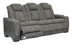 Slate power reclining sofa with three padded seat sections and contoured back cushions.