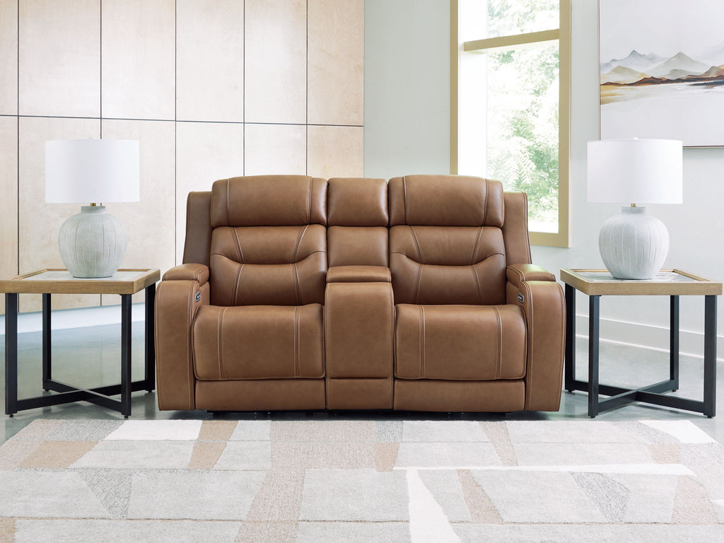 Power reclining loveseat with audio seating in brown, shown front view with footrests