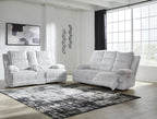 Light gray power reclining sofa and loveseat set with thick channel-tufted cushions