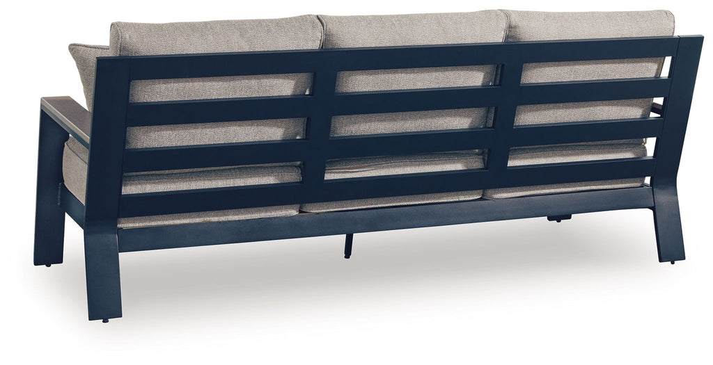 Outdoor sofa back view with dark blue frame and light gray cushion panels