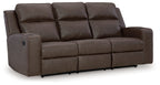 Reclining sofa with drop-down table, dark brown upholstery, low-profile arm design