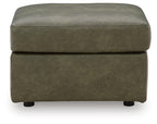 Olive-green rectangular upholstered ottoman with padded top and short legs.