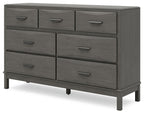 Gray wooden dresser with six drawers and silver bar pulls on tapered legs