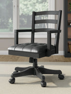 Swivel desk chair in black with dark padded seat and ladder back, casters on base