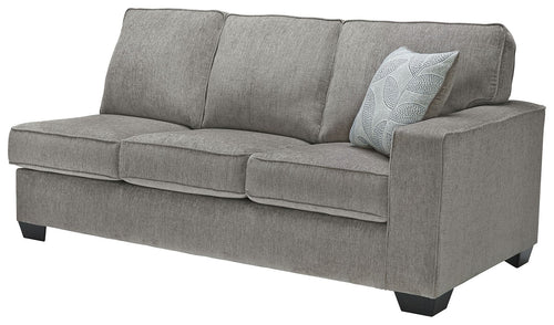 Grey fabric sofa sleeper with three seat cushions and a decorative pillow