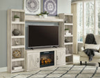 Beige entertainment center with open shelves, TV cabinet, and glowing electric fireplace
