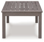 Rectangular cocktail table with brown slatted tabletop and open grooves