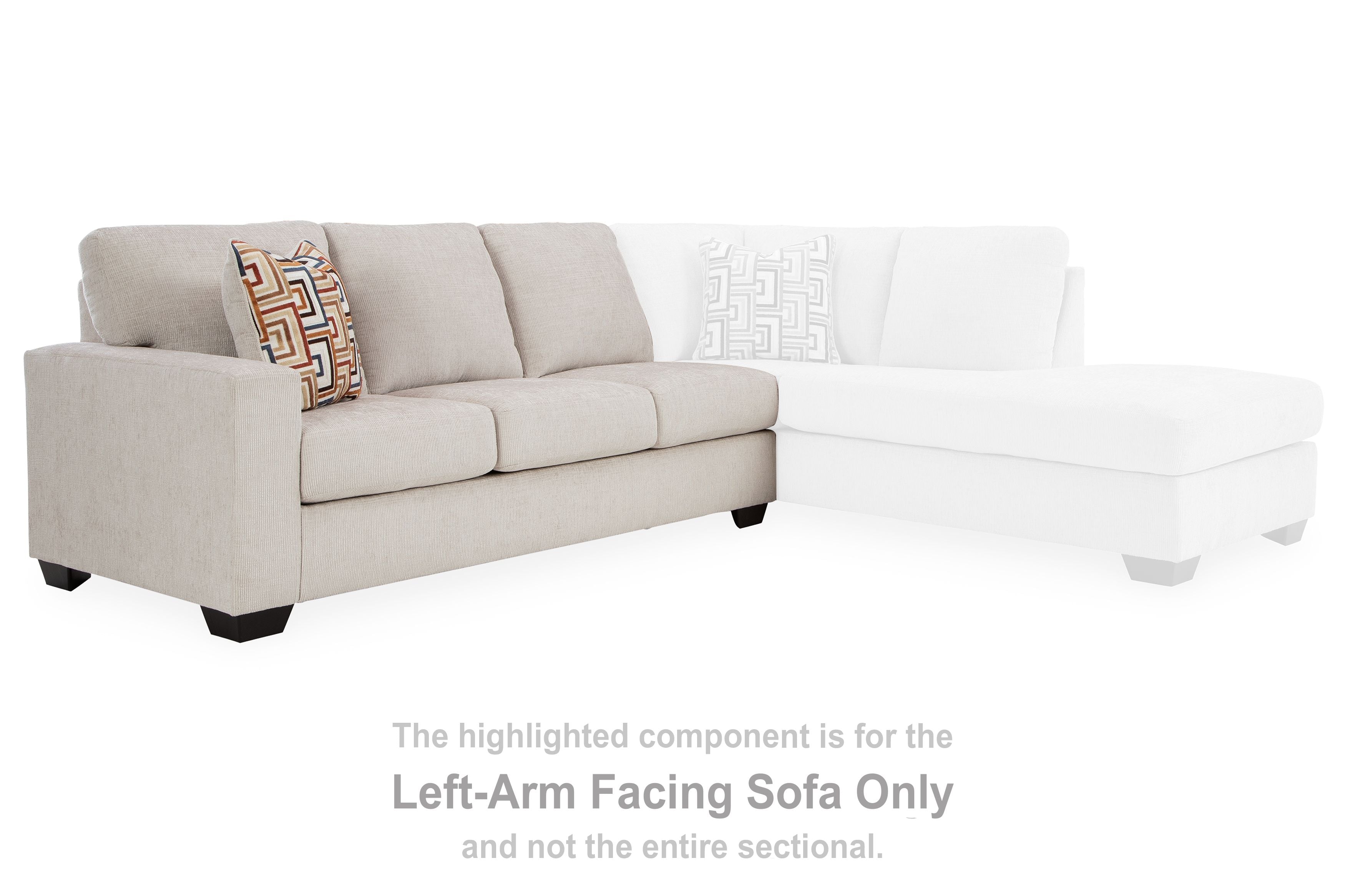 Left-arm facing stone sofa sectional piece with cushions and patterned throw pillow