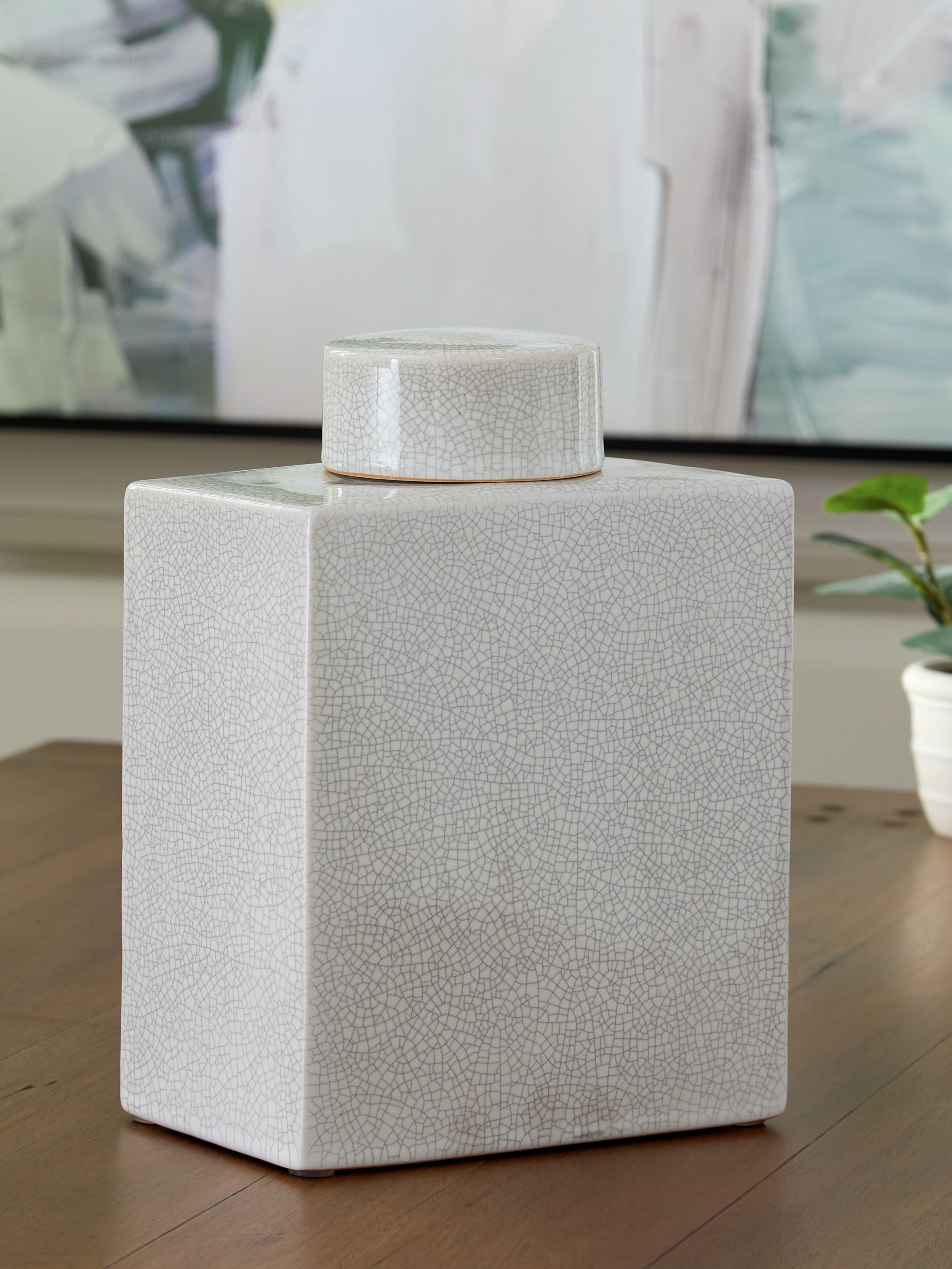 Haddworth jar on tabletop in white crackle ceramic with round lid