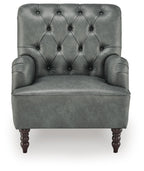 Dark gray velvet-look accent chair with tufted diamond back, winged arms, and wooden legs.