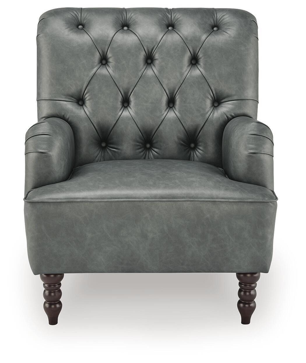 Dark gray velvet-look accent chair with tufted diamond back, winged arms, and wooden legs.