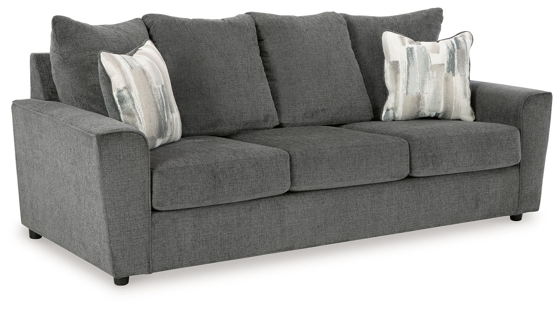 Dark gray fabric sofa with three seat cushions and five back pillows.