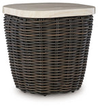 Dark brown wicker side table with round beige tabletop