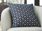 Abra decorative pillow with navy-and-white geometric diamond pattern, front close-up