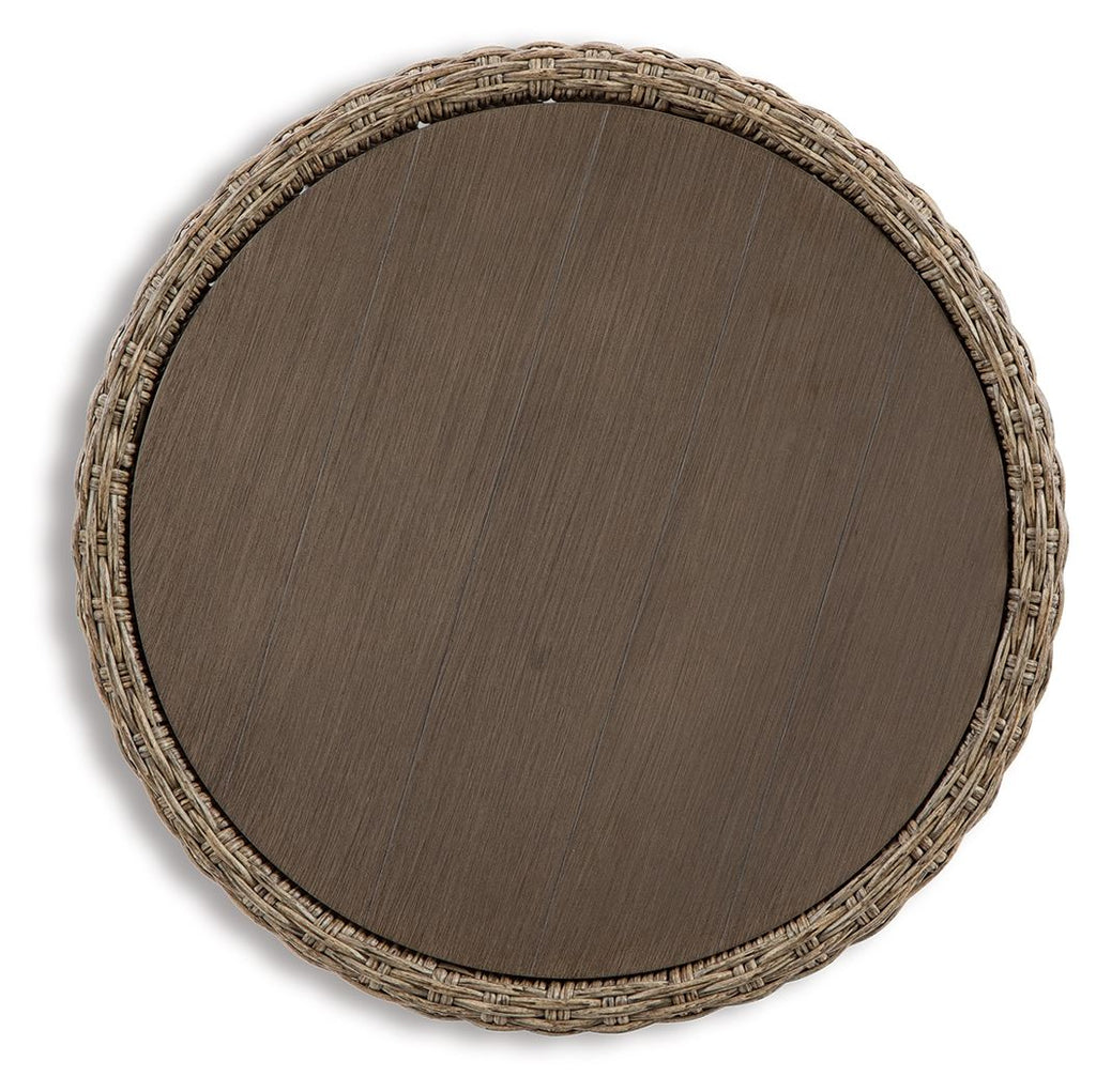 Beige round end table top view with woven rim and wood-tone round surface.