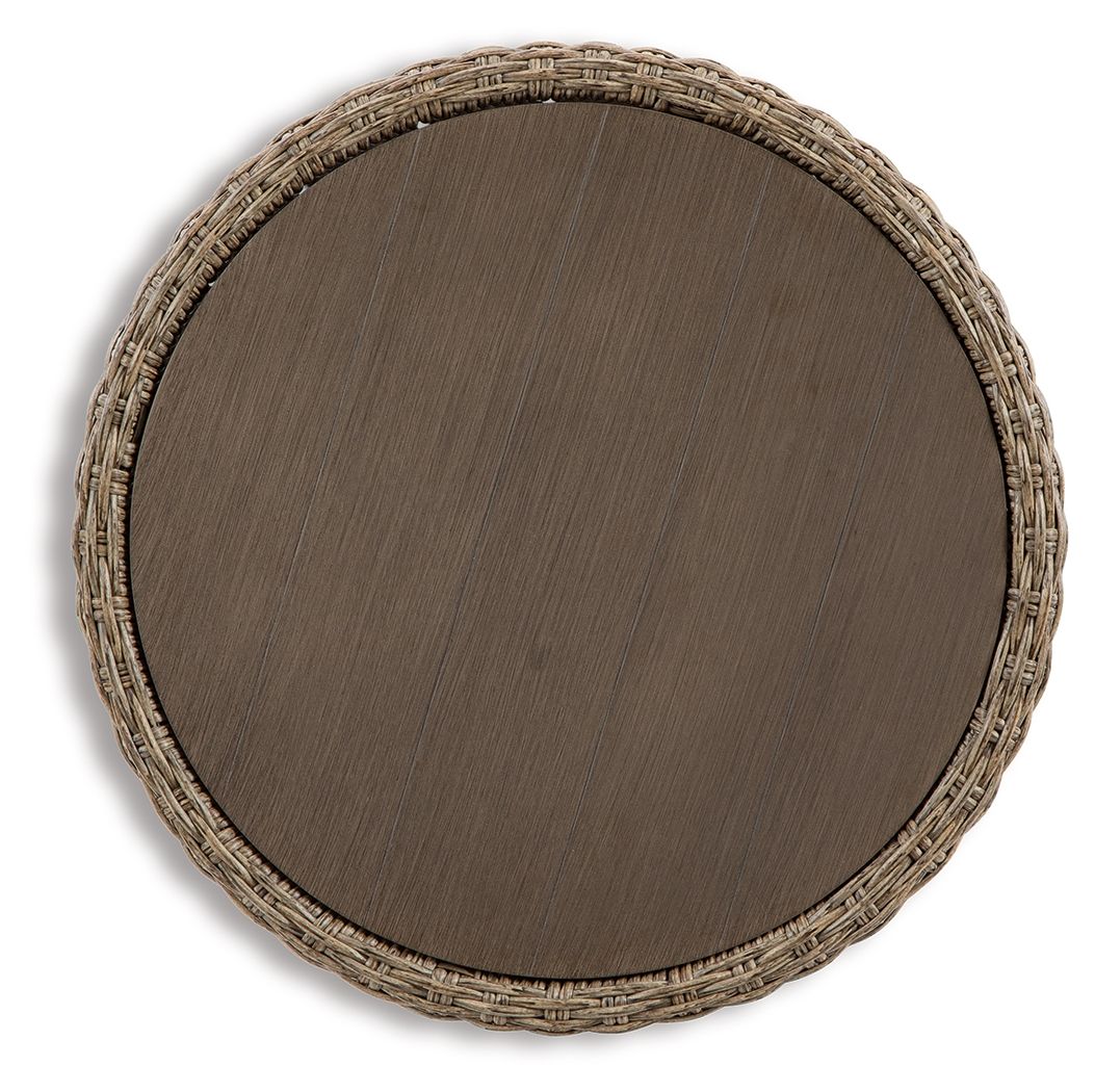 Beige round end table top view with woven rim and wood-tone round surface.