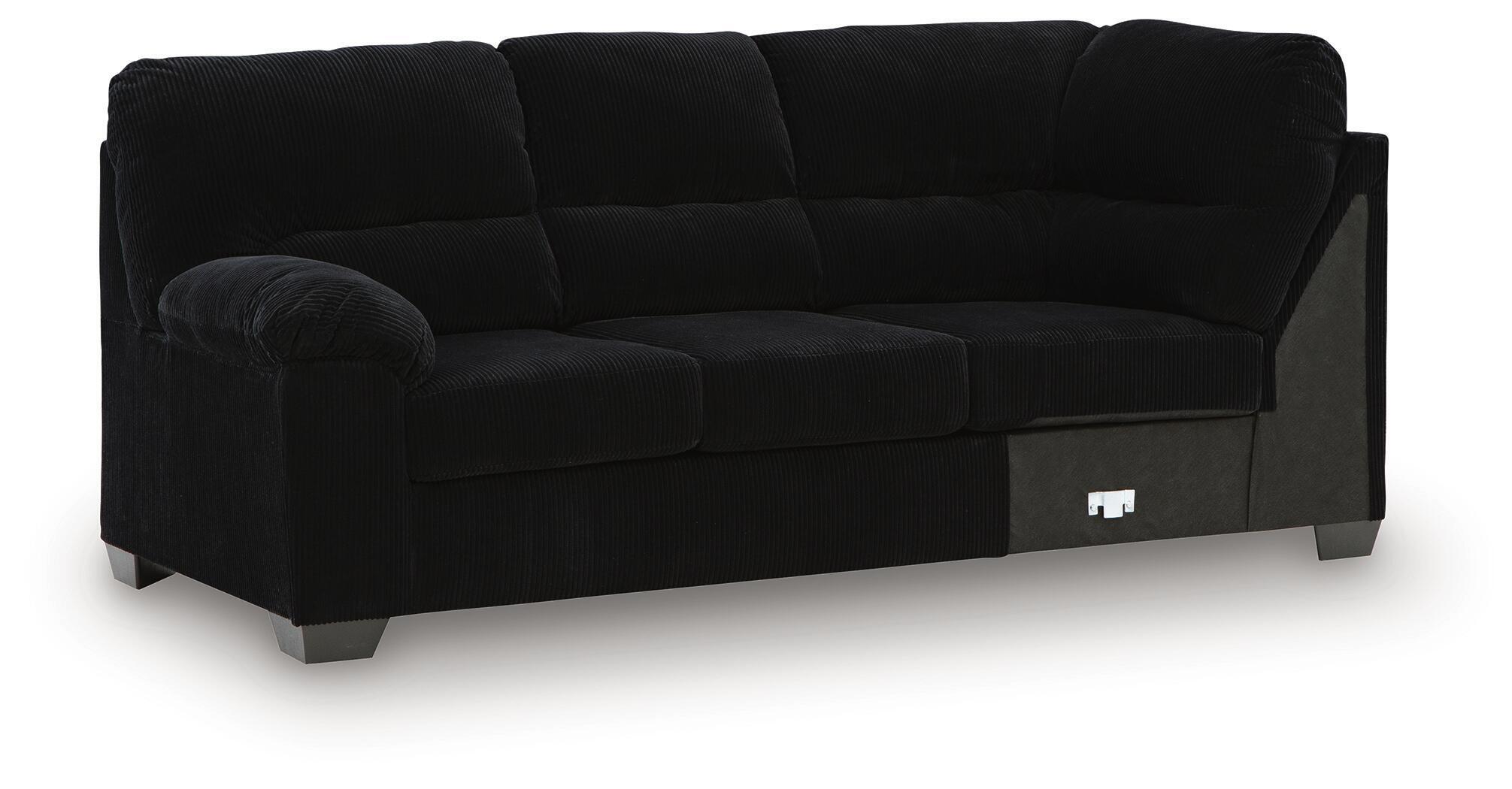 Black LAF sofa with corner wedge, tufted back cushions and track arms