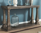 Gray sofa table with lower shelf and turned legs, rectangular top