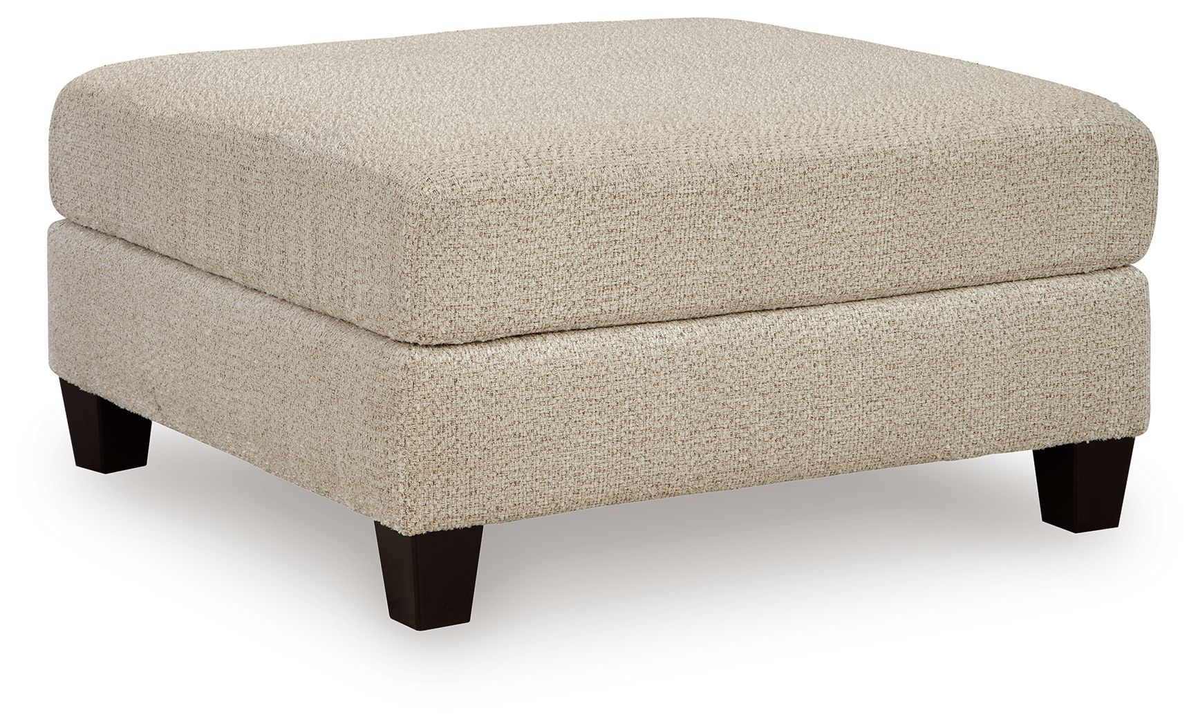 Latte oversized accent ottoman with boxy cushioned seat and tapered dark legs