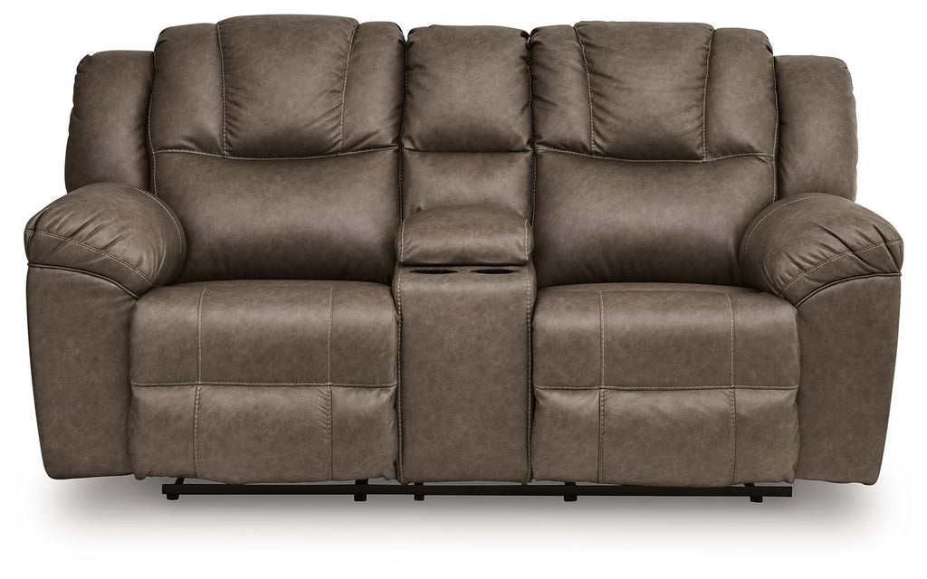 Dark brown fabric double reclining loveseat with padded seat panels and tufted back cushions