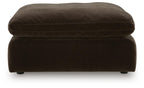 Oversized accent ottoman in dark brown, rounded top cushion and low legs