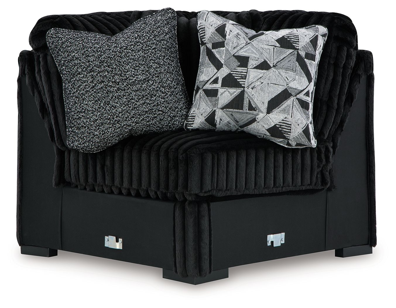 Black wedge sofa with ribbed fabric, gray and geometric accent cushions