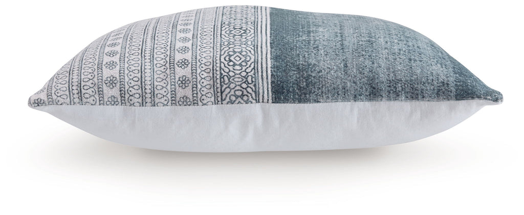Blue throw pillow side view with white geometric stripe pattern across front