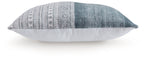 Blue throw pillow side view with white geometric stripe pattern across front
