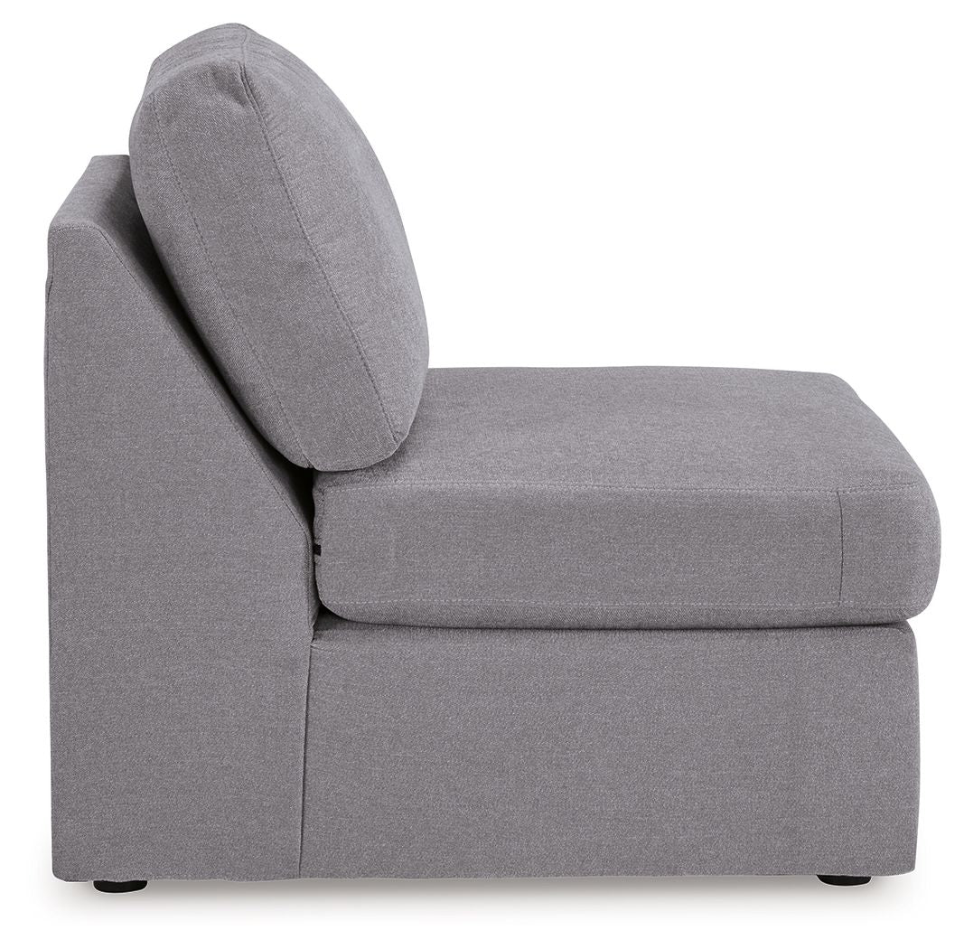 Gray armless chair with angled backrest and padded seat cushion, on short legs