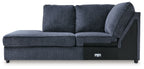 Cobalt blue corner chaise sofa with two back cushions and rolled arm detail