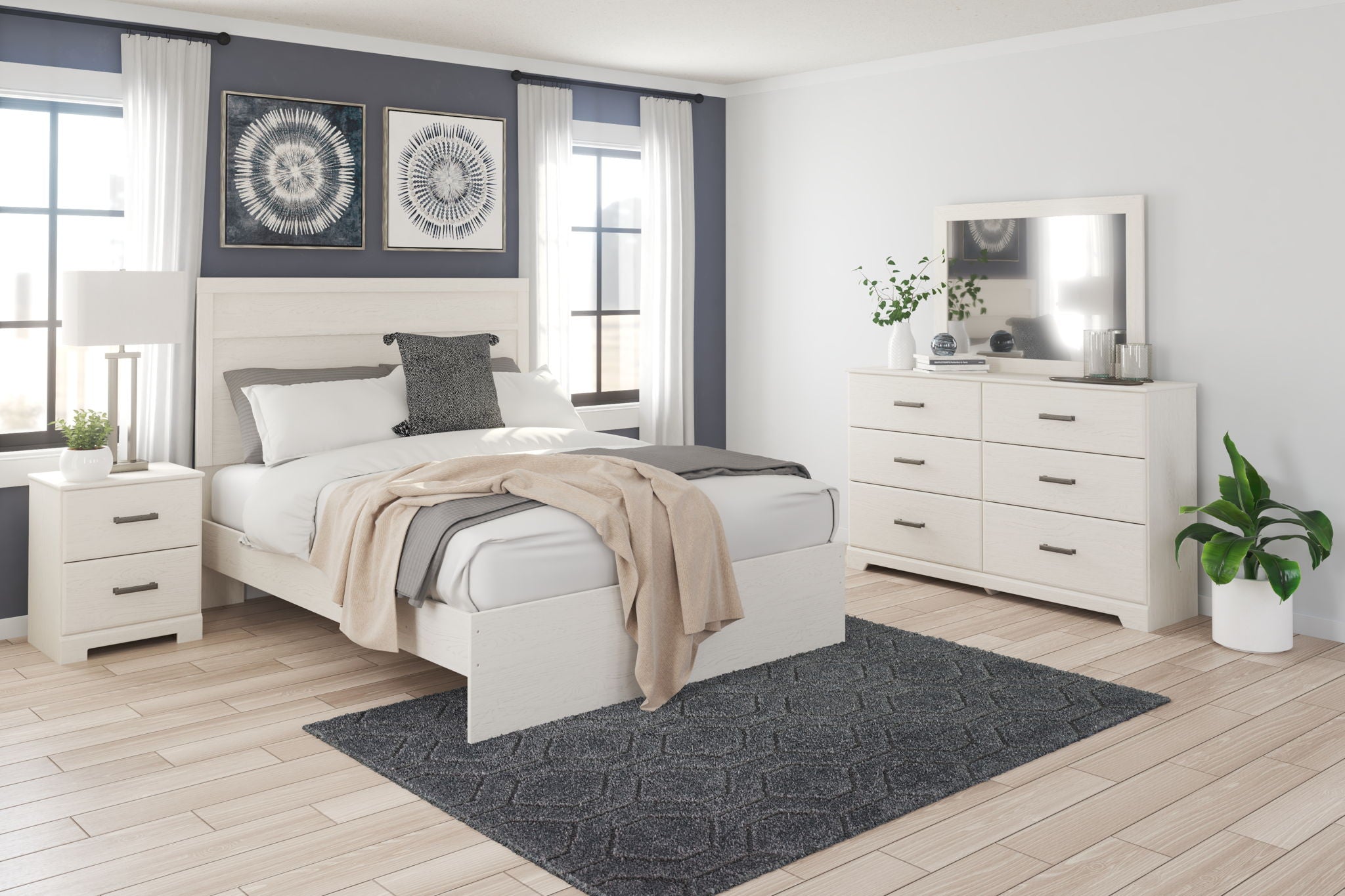 White dresser with mirror, featuring multiple drawers and black bar handles
