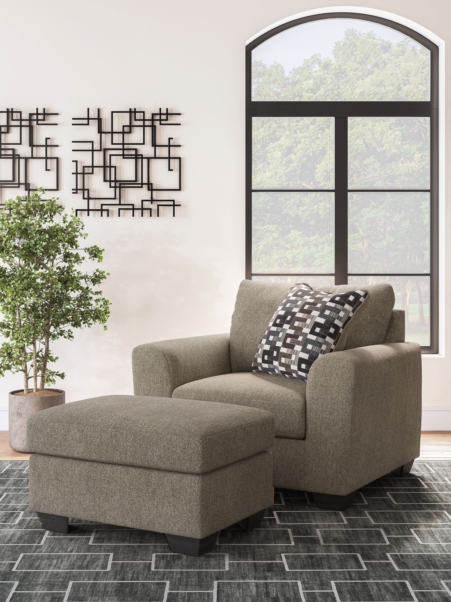 Beige fabric sectional chaise with geometric check throw pillow and ottoman-style seat
