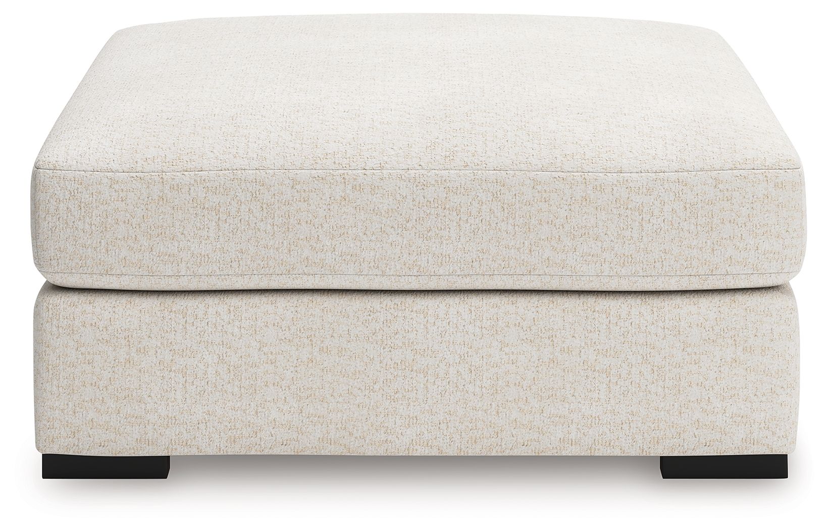 Vanilla upholstered accent ottoman with padded top, black block feet
