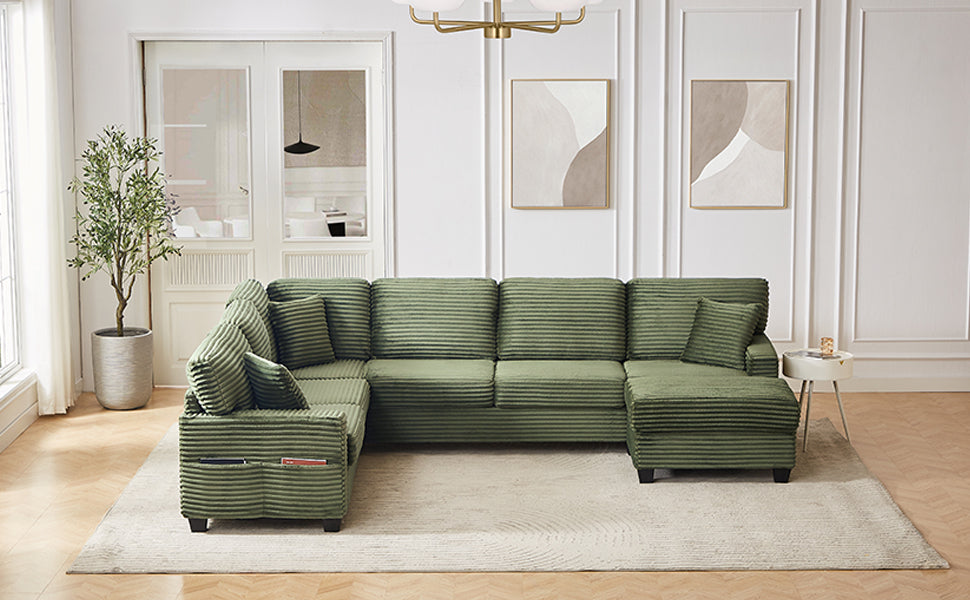 Green corduroy U-shaped sectional sofa with ottoman and aligned back cushions