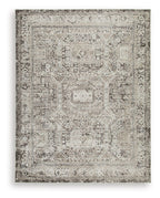 Junley rug with distressed geometric border in light gray and off-white