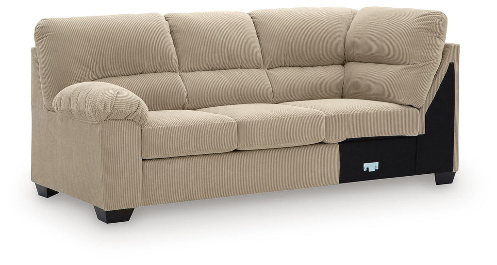 Upholstered sofa with corner wedge, light sand fabric, tufted back and seat cushions