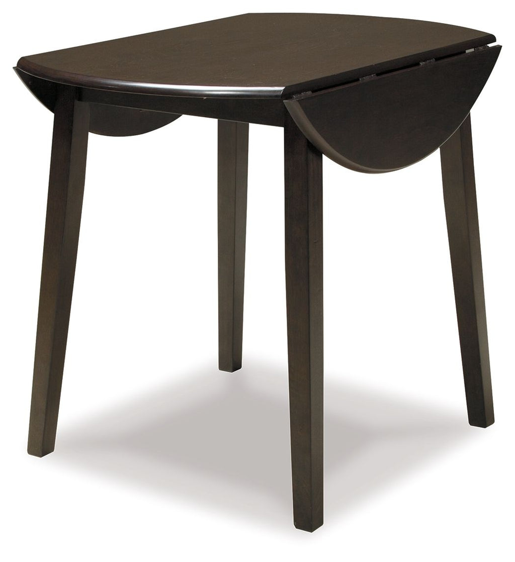 Dark brown round drop-leaf table with curved edge and tapered legs