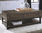 Lift-top cocktail table in grayish-brown wood with front drawer details and lower shelf