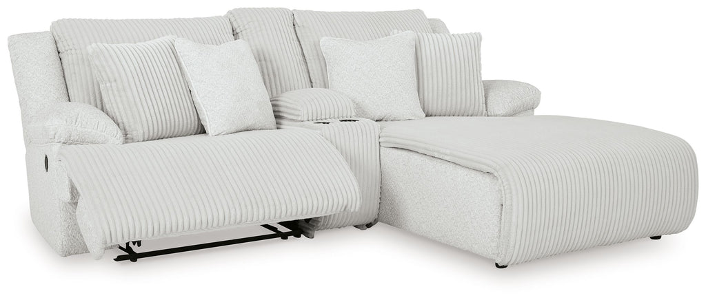 White striped reclining sectional with chaise and multiple back cushions