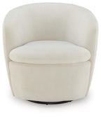 Swivel accent chair in light cream velvet with rounded back, arms, and seat.