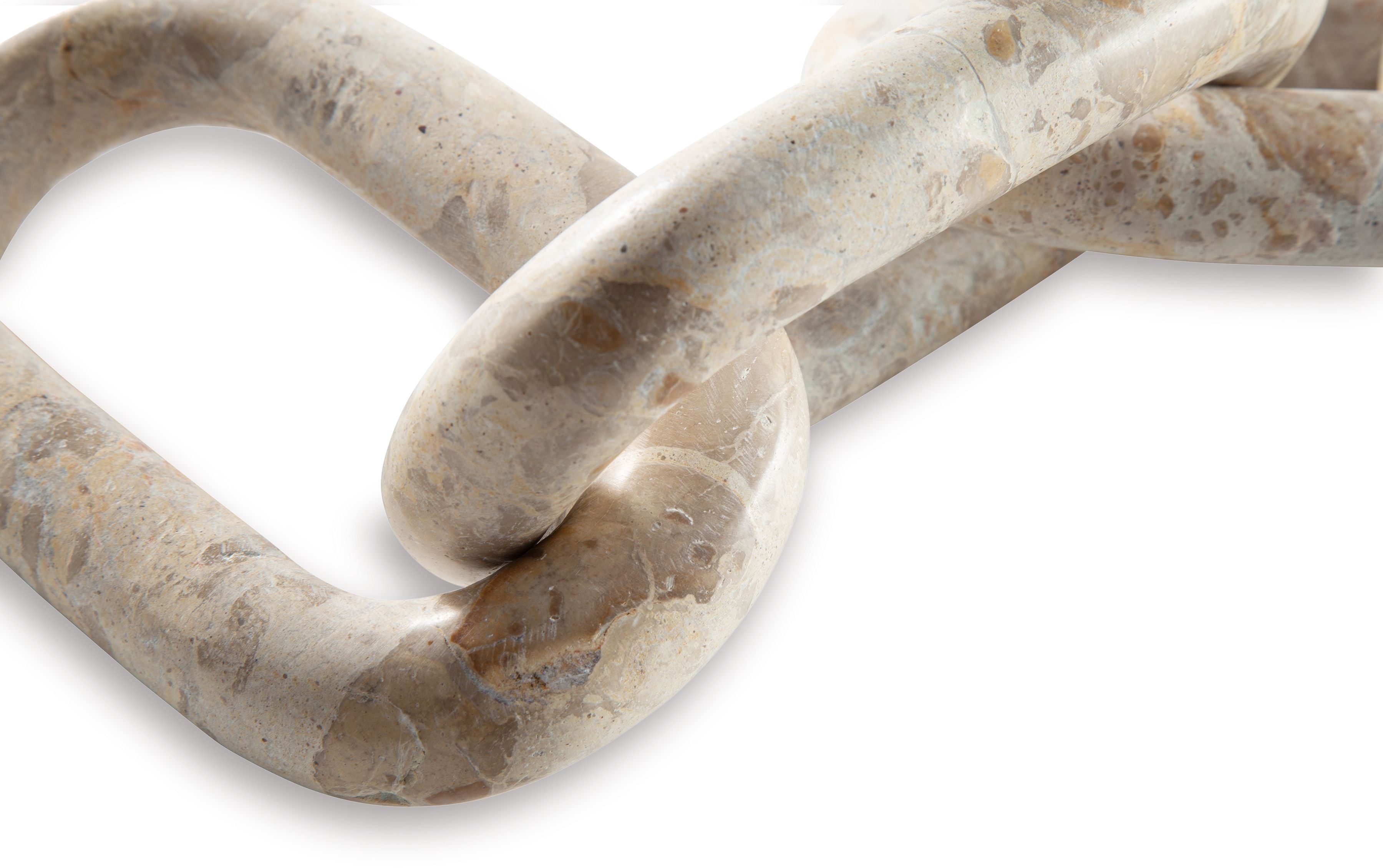Light beige abstract sculpture with interlocking chain links, side view