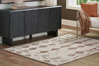 Geometric area rug with ivory base and dark brown grid diamond pattern, textured weave