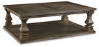 Gray rectangular cocktail table with two-tier open shelf and turned legs