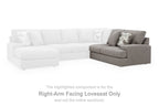 Smoke gray right-arm facing loveseat with white sectional seats and pillows