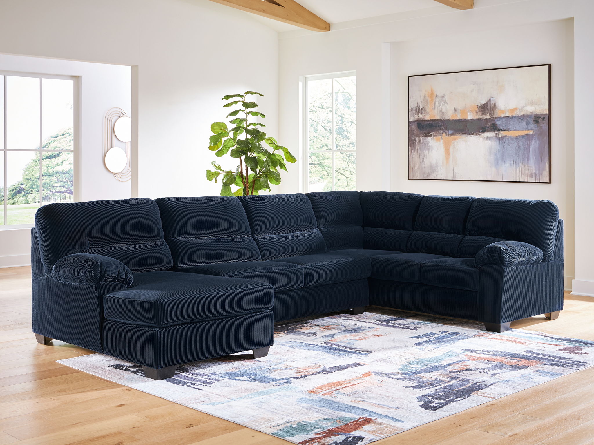 Navy sectional sofa with corner chaise and wide armrests