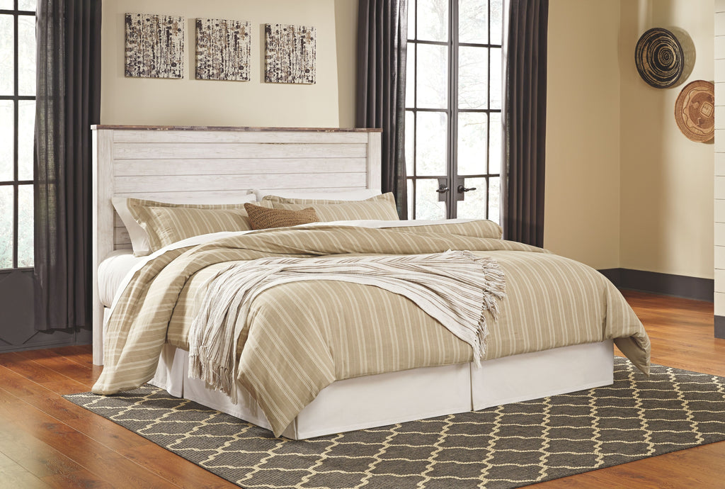 Willowton bedroom set panel headboard bed with striped comforter and pillows