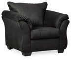 Black arm chair with rolled arms, deep seat cushion, and square back