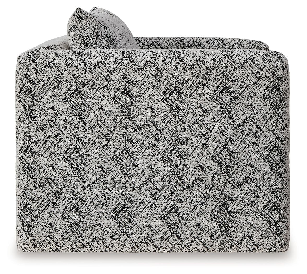Close-up of black-and-white textured upholstery on accent chair back and seat
