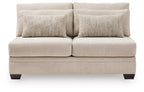 Armless loveseat with light beige upholstery, two back cushions, and dark legs